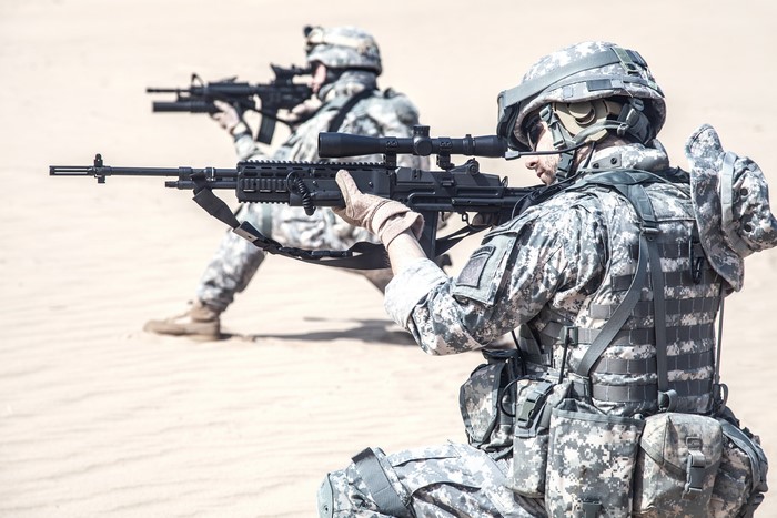 Soldiers with Assault Rifles in Desert