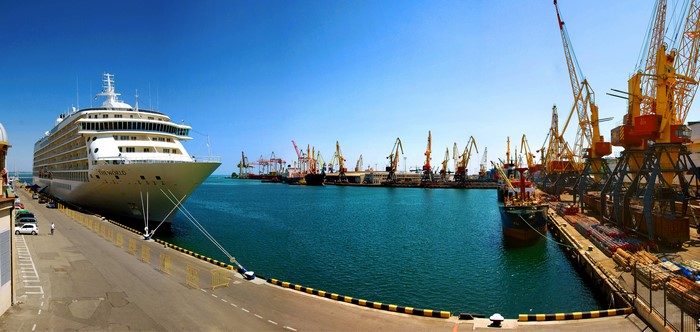 Cruise liner docked at Odessa port with cranes