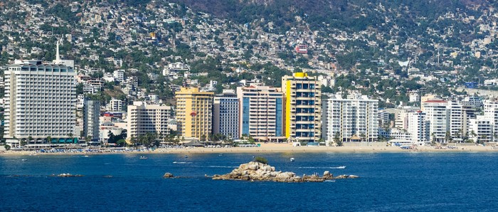 Acapulco coastline with hotels and houses on a hill