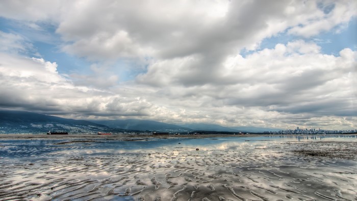 Vancouver Bay with Mountains and City Skyline