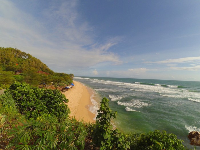 Beach and Ocean View from a Cliffside in Tanjungsari, Indonesia