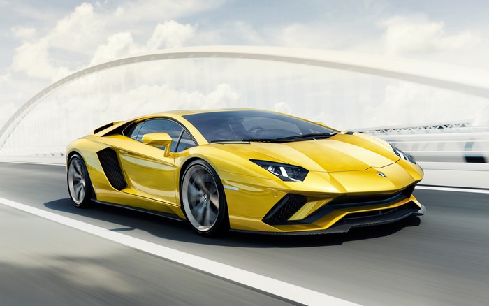 Yellow Lamborghini Aventador S on a Bridge
