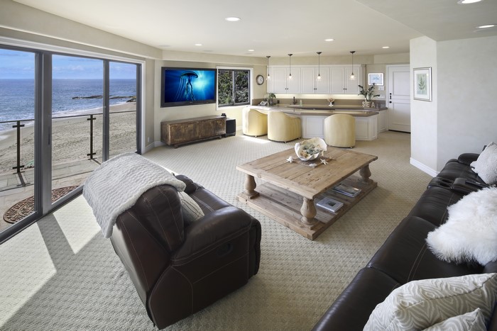 Living room with ocean view and kitchen