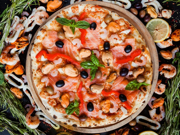 Seafood Pizza with Shrimp, Mussels, Olives, and Salmon