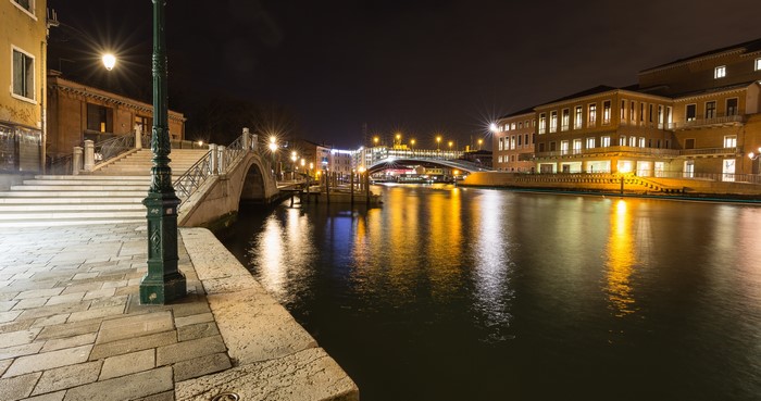 Venice Canal at Night with Bridges and Buildings