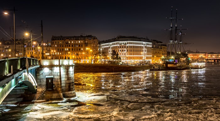 Night view of St. Petersburg with ice on the river