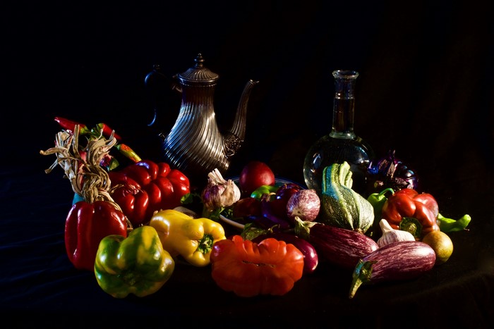 Still-life of vegetables and a jug container