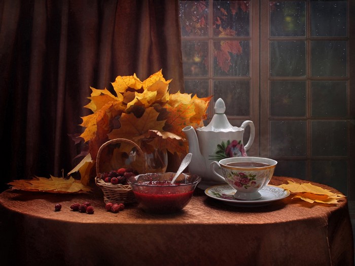 Still-life with tea set and autumn leaves