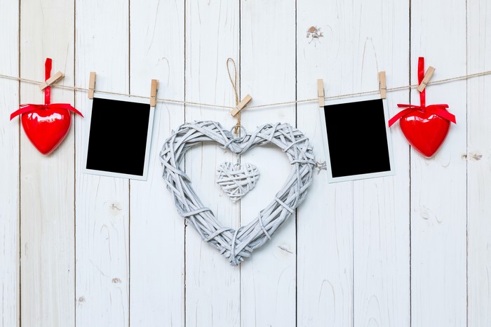 Valentine's Day hearts and photos on a clothesline