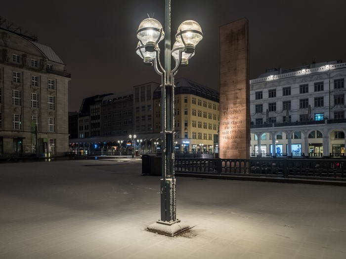 Winter night in Hamburg with snow and street lights
