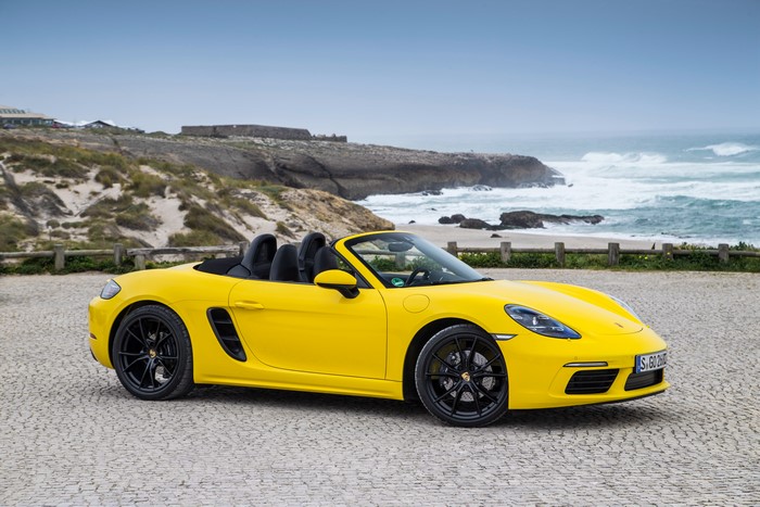 Yellow Porsche 718 Boxster Cabriolet by the Ocean