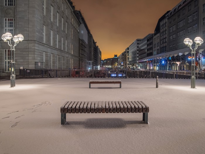 Snowy street in Hamburg, Germany at dusk