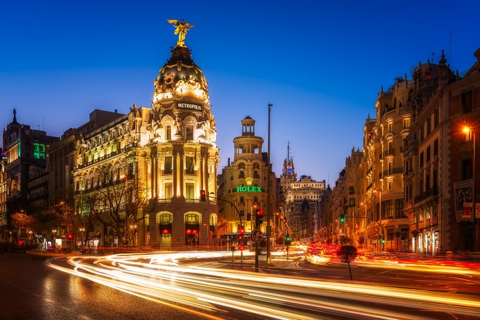 Metropolis Building and Rolex Building in Madrid at Night