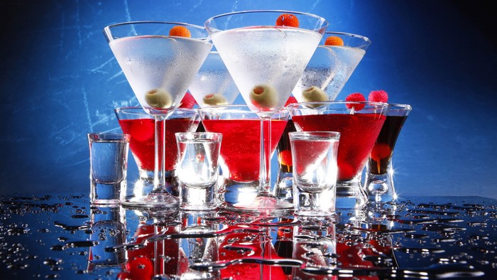 Cocktails and Shot Glasses with Olives and Raspberries