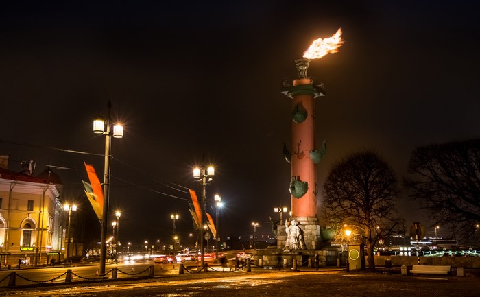 Rostral Column with Flame at Night in St. Petersburg, Russia