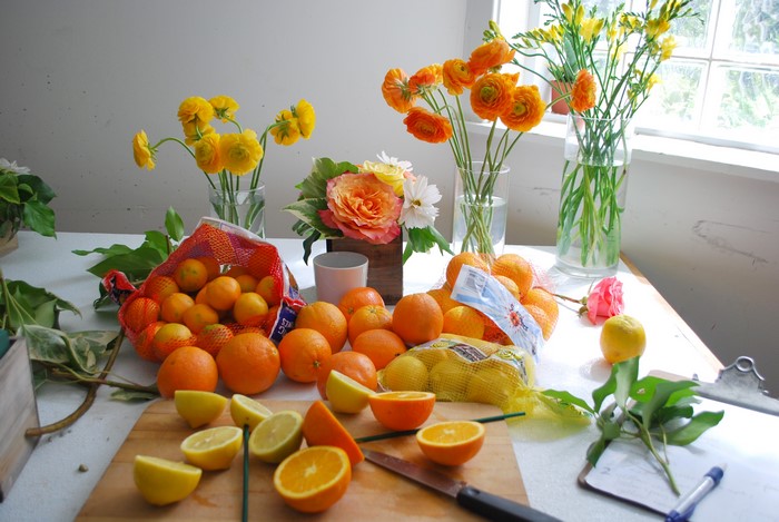 Oranges, Lemons, and Flowers on a Table
