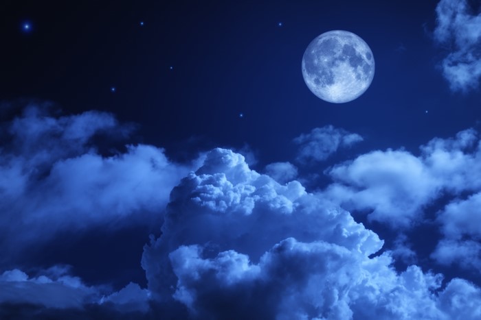 Full Moon and Clouds in the Night Sky