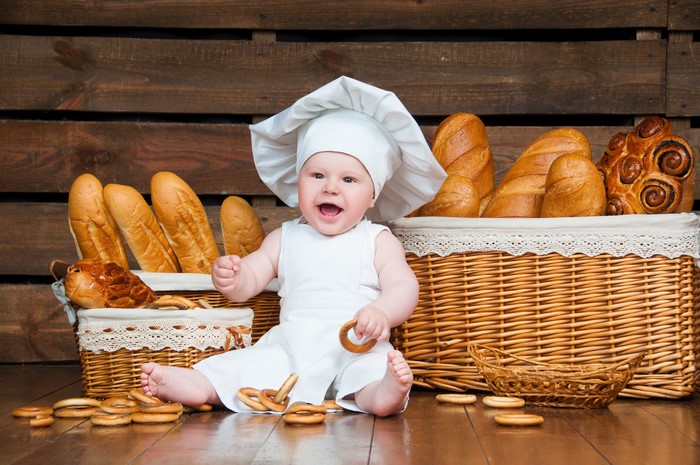 Baby in Chef Hat with Bread