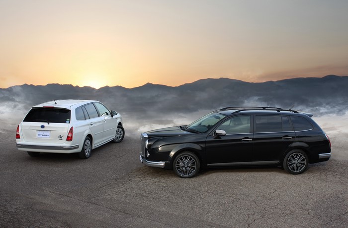 Two Mitsuoka Ryugi cars at sunset