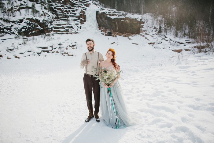 Bride and Groom in Winter Landscape