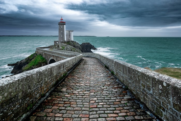 Phare du Petit Minou lighthouse and stone bridge in Brittany, France