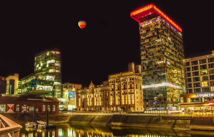 Hot air balloon over Duesseldorf at night