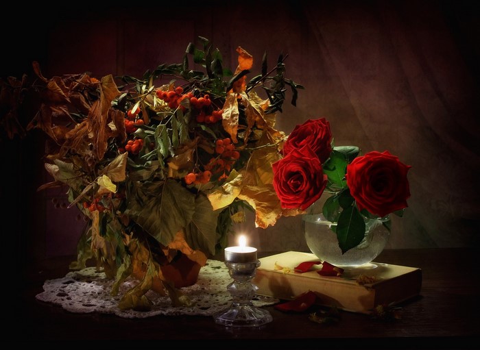 Still-life with red roses, sorbus, candle, and book