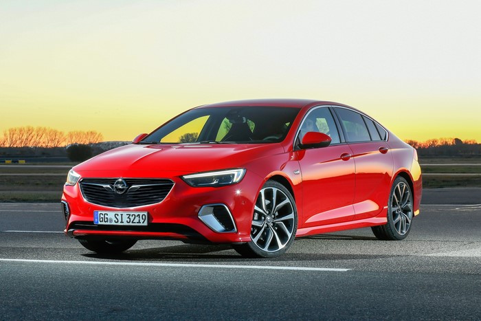 Red Opel Insignia GSi on a road