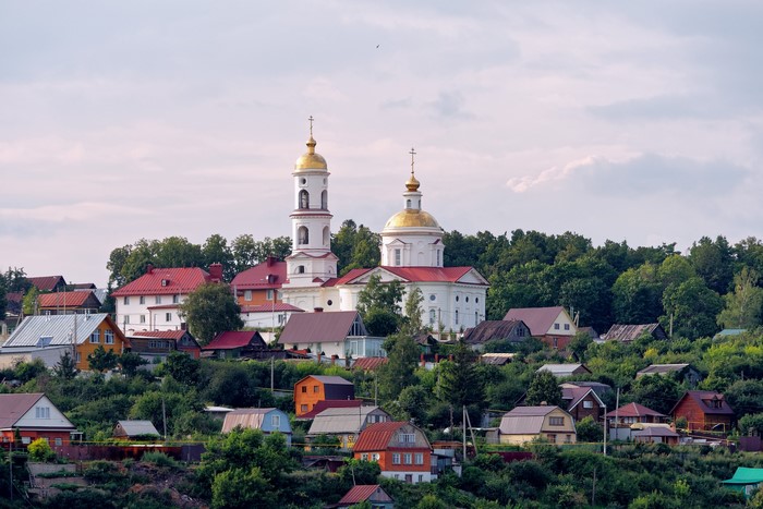 Church and houses on a hill in Klyuchishchi, Tatarstan, Russia