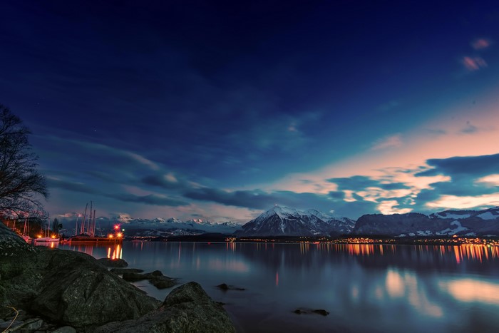 Lake and mountains at dusk in Spiez, Switzerland