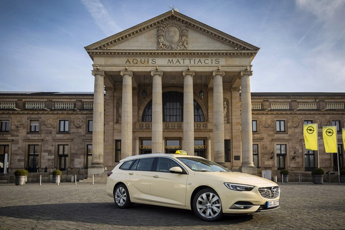 Opel Insignia Sports Tourer Taxi in front of Kurhaus Wiesbaden