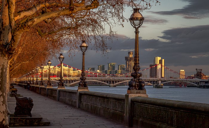 London Thames River with Chelsea Bridge and Street Lights