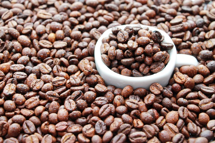 Coffee beans in a cup