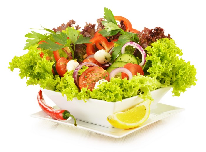 Salad with vegetables, bell pepper, and lemon