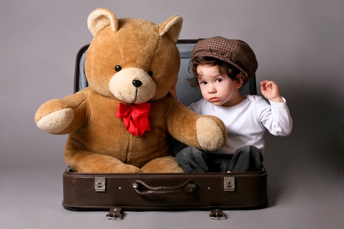 Boy and Teddy Bear in Suitcase