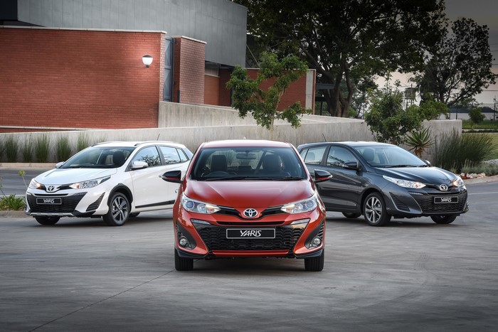 Three Toyota Yaris cars