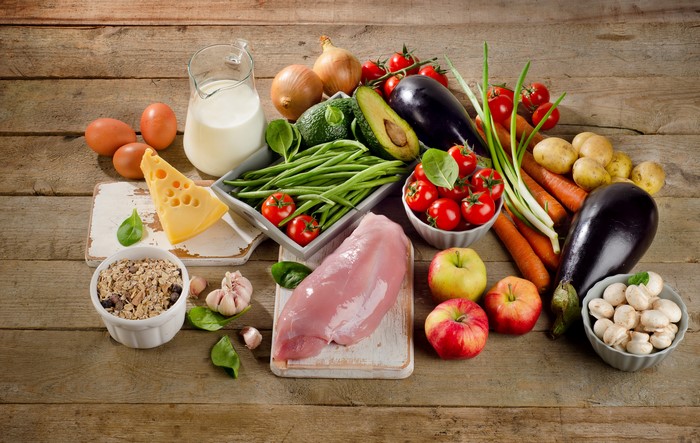 Assortment of fresh foods on wooden table