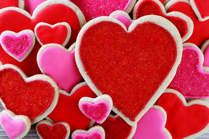 Heart-shaped cookies with red and pink frosting