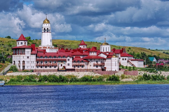 Svyato-Bogoroditsky Monastery on the banks of a river in Russia