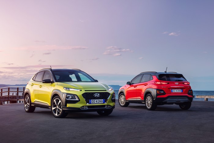 Two Hyundai Kona cars by the sea