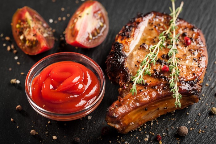 Grilled Meat with Ketchup and Tomatoes