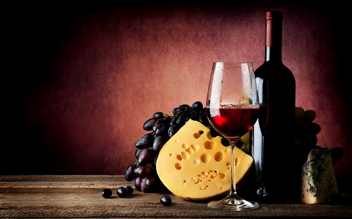Still-life of wine, grapes, and cheese