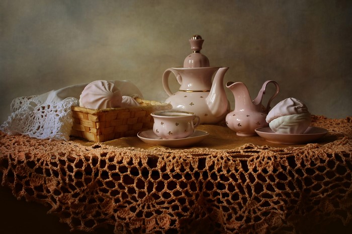 Still-life with pink tea set and zefir