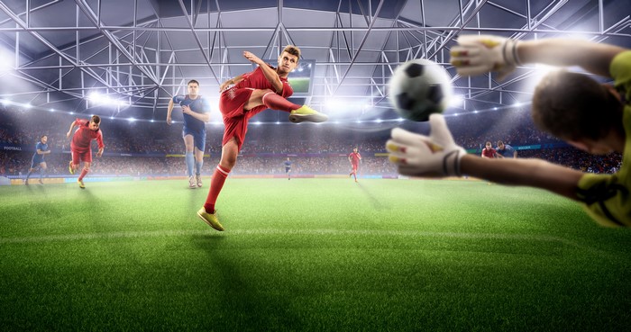 Soccer players in a stadium during a match