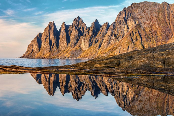 Senja Island Rocky Coastline Reflected in Water