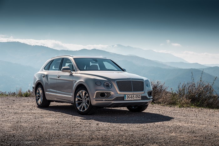 Bentley Bentayga SUV parked on a mountain road
