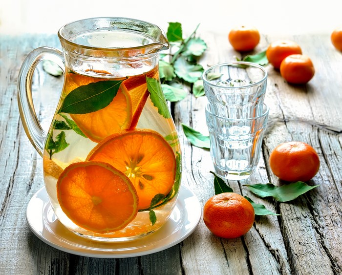 4K Orange and Mint Infused Water in a Pitcher