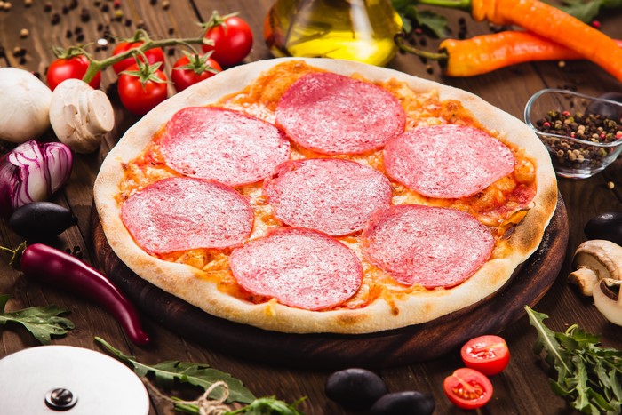 Pizza with sausage and vegetables