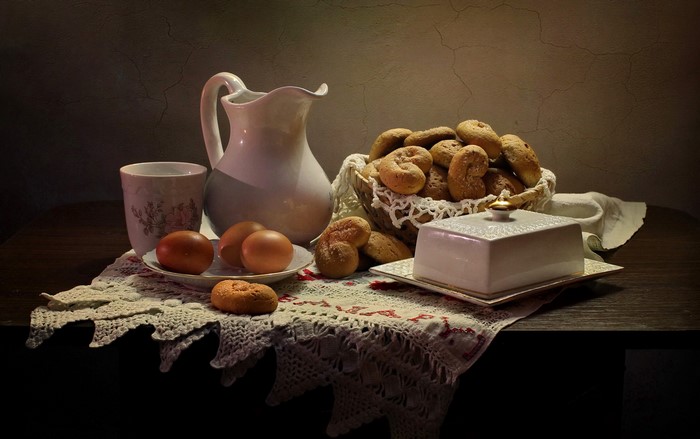 Still-life with bread, eggs, and a pitcher