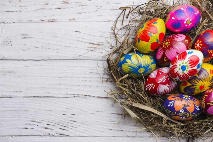 Easter Eggs in a Nest on Wood Planks